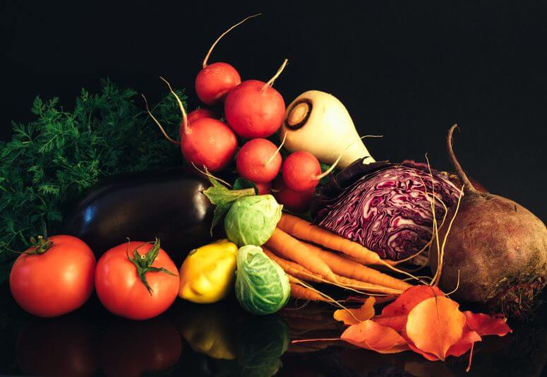 A colourful bunch of fresh vegetables on a table is a great example of healthy eating